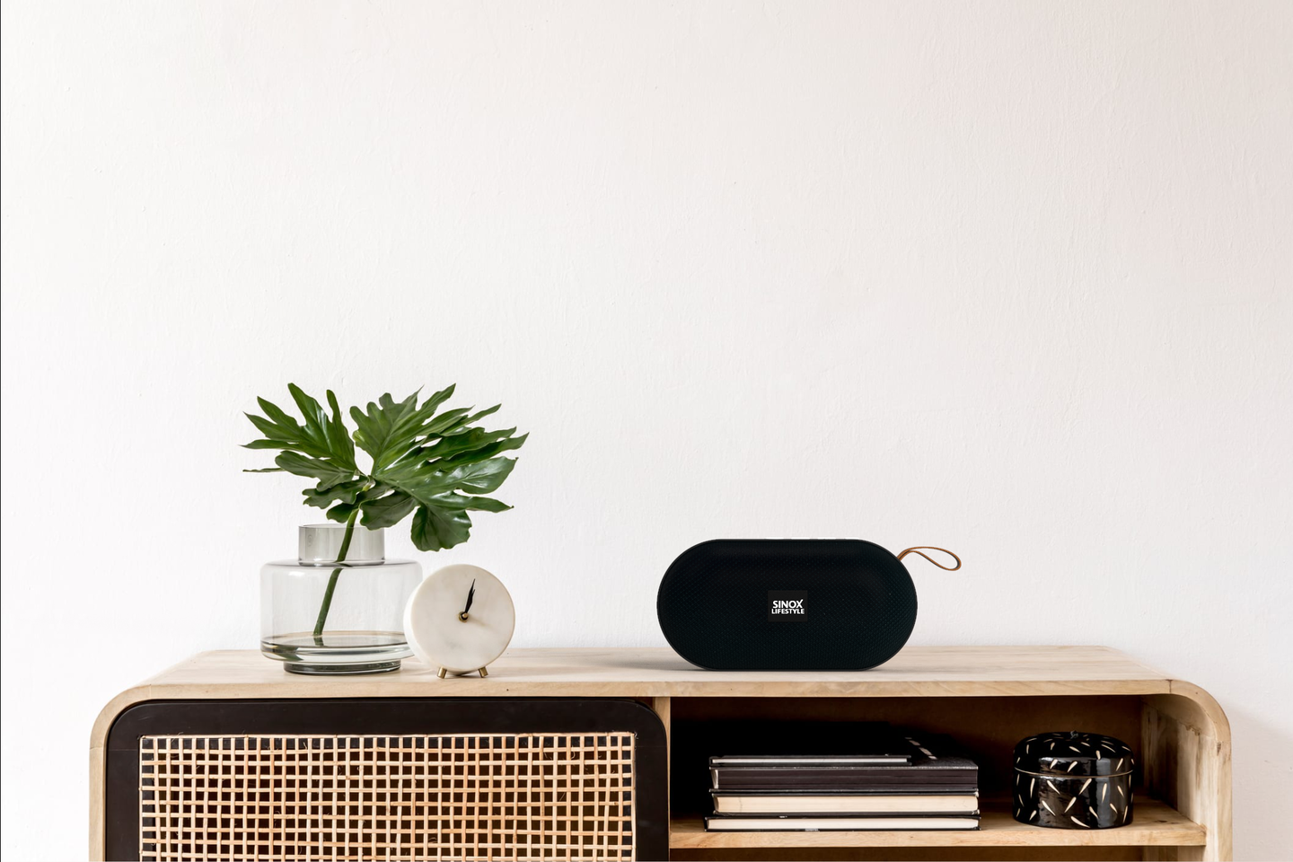 SINOX SXL4010 Bluetooth speaker on sideboard in home setting