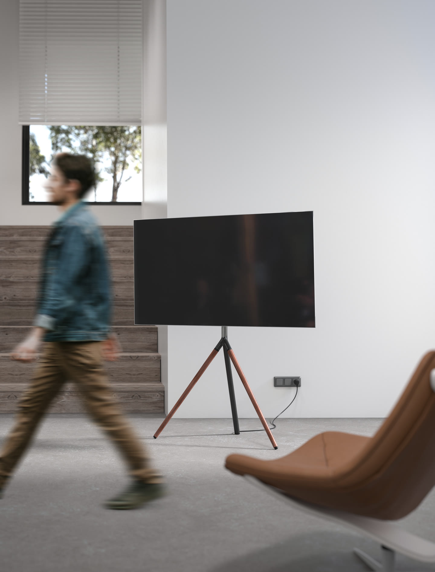 SINOX tripod TV floor stand in a living room